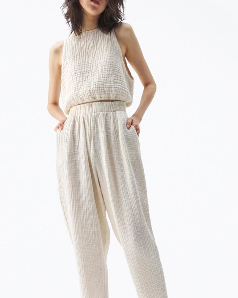 Front of a model wearing a size O/S High-Rise Cotton-Gauze Straight-Leg Pants In Beige in Beige by iKiKIZ. | dia_product_style_image_id:360244